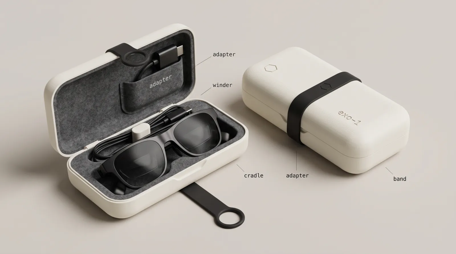 The glasses case open, with black display glasses in a grey felt cradle, the cable wound on a post and an adapter in a felt pocket, beside the closed case with a black rubber band and exo-1 printed on the lid.